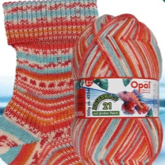 Colorful knitted sock and ball of yarn with Opal brand label on a white background