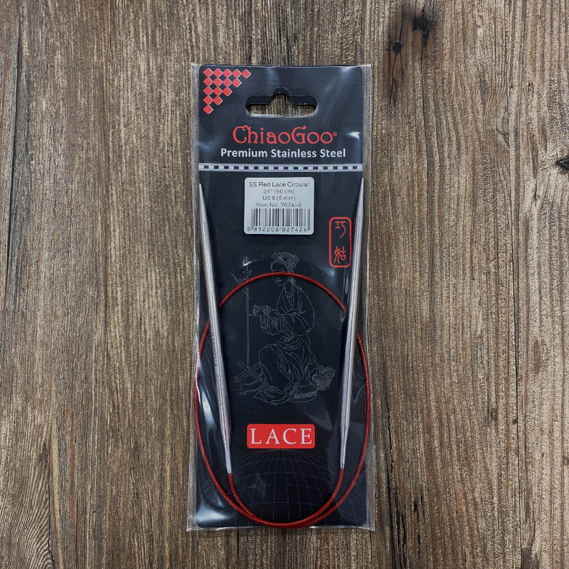 ChiaoGoo lace knitting needles in packaging on a wooden surface