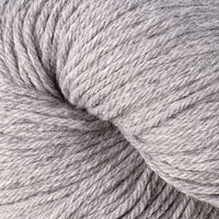 Close-up of gray heathered yarn on a white background