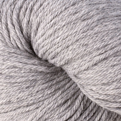 Close-up of gray heathered yarn on a white background