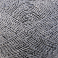 Close-up of gray yarn with a textured pattern