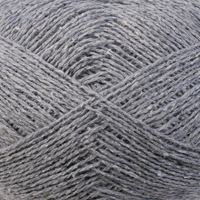 Close-up of gray yarn with a textured pattern