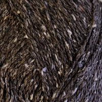 Close-up of a textured brown yarn with light tweed neps