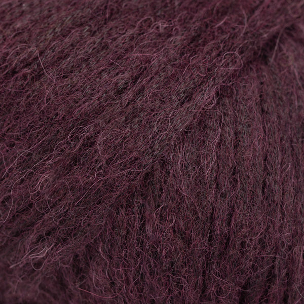 Close-up of dark wine purple yarn 