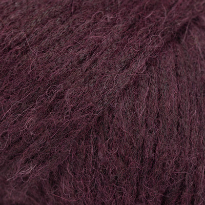 Close-up of dark wine purple yarn 