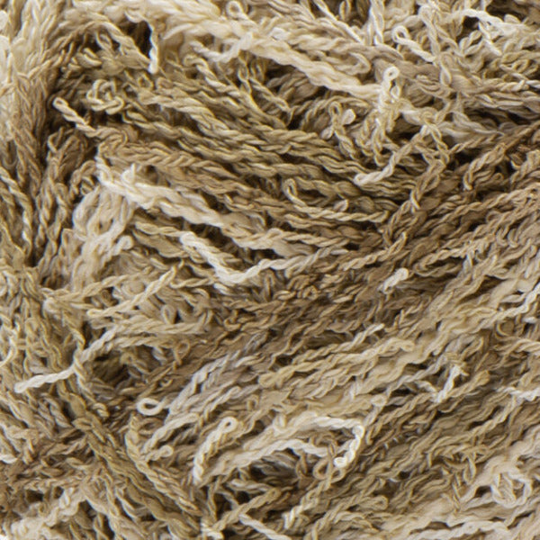 Close up of textured tan and white yarn 