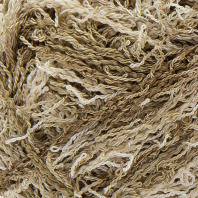 Close up of textured tan and white yarn 