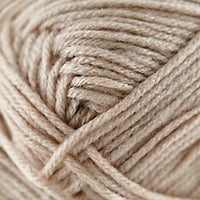 Close-up of a ball of beige yarn