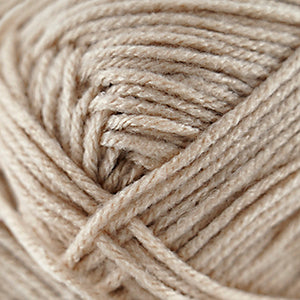 Close-up of a ball of beige yarn