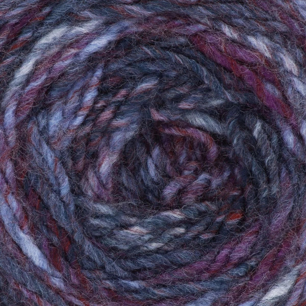 close up of multicoloured yarn in shades of blue and purple