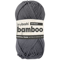 Gray skein of yarn with a label on a white background