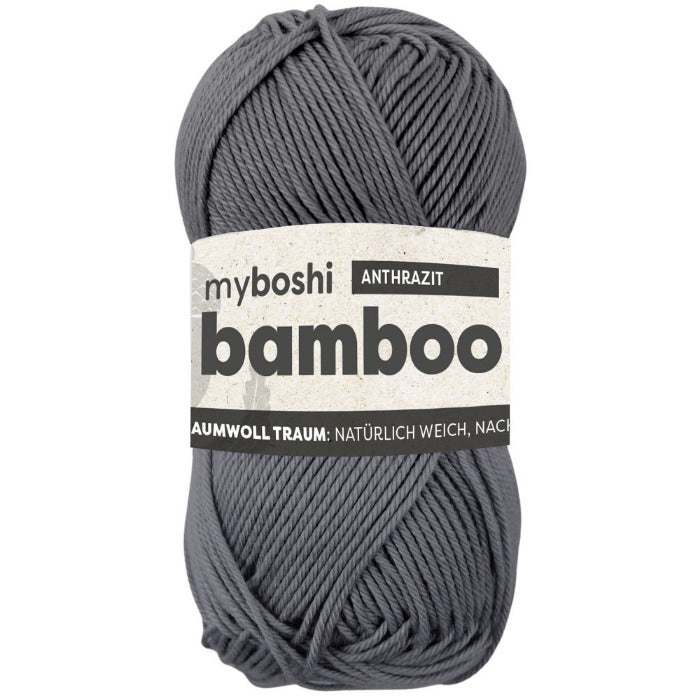 Gray skein of yarn with a label on a white background