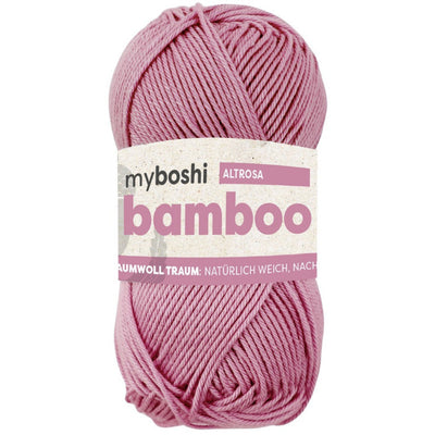 Pink ball of yarn with 'myboshi' label on a white background