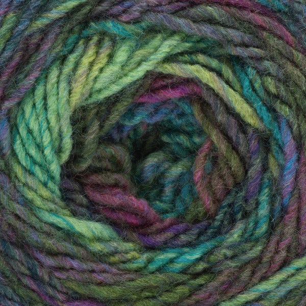 Close-up of a ball of multicolored yarn with green, purple, and blue hues.