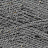 Close-up of gray yarn with brown and black specks