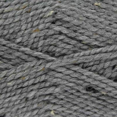 Close-up of gray yarn with brown and black specks