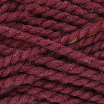 Close-up of dark rose pink yarn with multicoloured specks