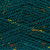 Close-up of teal yarn with orange, yellow, and green specks