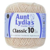 Ball of Aunt Lydia's Crochet Thread Classic 10 Natural on a white background