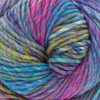 Multicolored ball of yarn with shades of blue, pink, purple, and yellow.