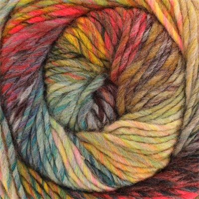 Close up of a ball of multicoloured yarn in shades of hot coral, yellow, blue, and burgundy