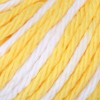 Close-up of yellow and white yarn strands