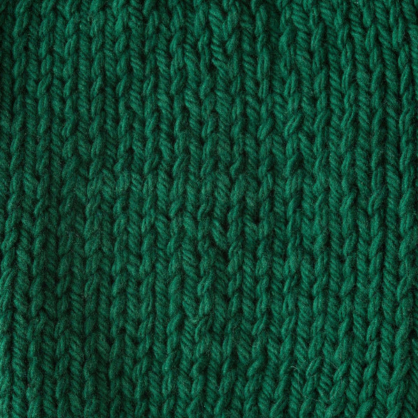 Close-up of green knitted fabric texture