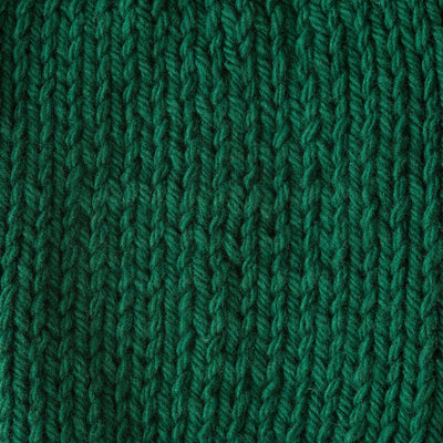 Close-up of green knitted fabric texture