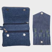 Denim needle case with multiple compartments on a wjite background