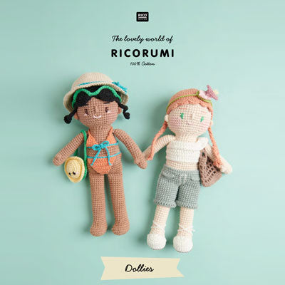 A book cover with two crochet dolls holding hands on a light blue background with 'Ricorumi' branding.
