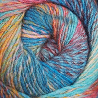 Close-up of a skein of multicolored yarn with blue, green, orance, burgundy, and pink hues.