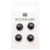 Four Black button eyes on a white card with 'Rico Design' branding