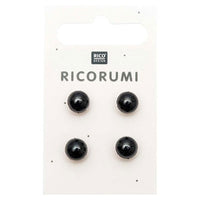 Four Black button eyes on a white card with 'Rico Design' branding