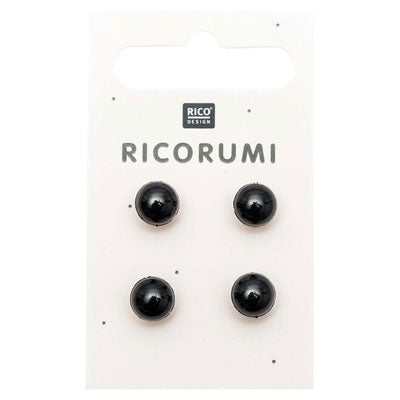 Four Black button eyes on a white card with 'Rico Design' branding