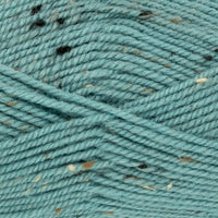 Close-up of light teal yarn with tweed speckles 