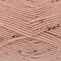 Close-up of pink yarn with tweed specks