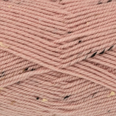 Close-up of pink yarn with tweed specks