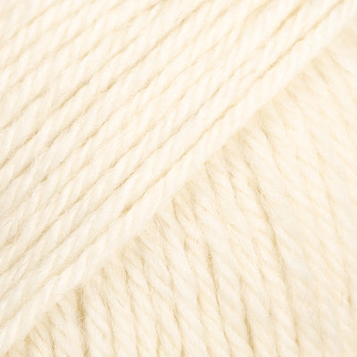 Close up of a ball of off-white yarn