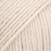 Close-up of pale beige yarn ball