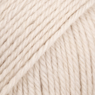 Close-up of pale beige yarn ball