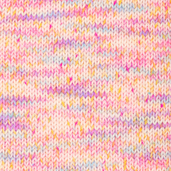 Close-up of a knitted fabric with multicolored yarn.