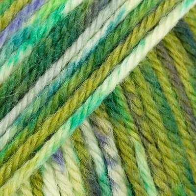 Close-up of multicolored yarn with greens, yellow, and blue speckles
