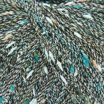 Close-up of a multicoloured textured yarn with shades of grey, teal, tan, and white