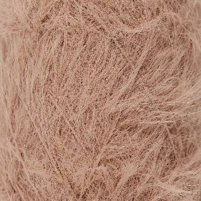 Close up detail of soft, furry light brown lace weight yarn