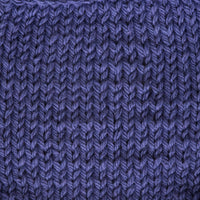 Close-up of a knitted purple fabric 