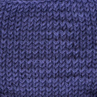 Close-up of a knitted purple fabric 
