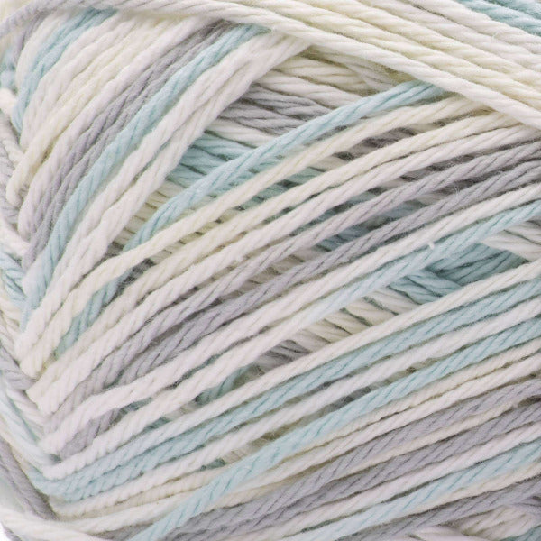 Close-up of pale grey, blue and white yarn ball