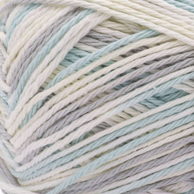 Close-up of pale grey, blue and white yarn ball