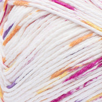 Close-up of a ball of yarn with pink, yellow, orange, and purple speckles