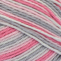 Close-up of pink, grey, and white yarn ball